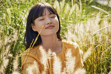 Lifestyle Visual of a woman sunbathing